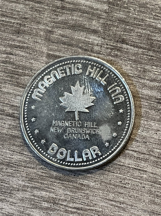 Moncton, New Brunswick 1979 Souvenir Dollar: Magnetic Hill